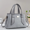 Minimalist light grey leather tote bag with vertical embossed texture and gold hardware - Gray
