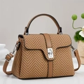 Classic beige herringbone woven square bag with brown leather trim and metal lock closure - Khaki/Earth Yellow