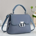 Blue denim texture handbag with silver metal lock and adjustable shoulder strap - Blue