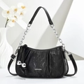 Detail of black pleated cloud bag featuring silver metal chain and fashion text print - Black