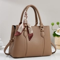 Classic tan faux leather tote bag with elegant printed scarf and gold hardware accents - Brown