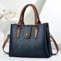 Large geometric embossed navy shoulder bag with brown straps and detachable strap - 30cm x 12cm x 23cm / Blue