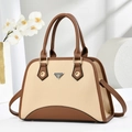 Elegant beige and brown leather handbag with adjustable strap and metallic logo plaque - Khaki