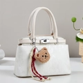 Large capacity cream white shoulder bag with metal turn-lock and teddy bear charm decor - Off-white