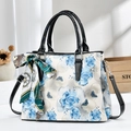Large ink-style floral print handbag with blue roses and decorative silk scarf detail - Blue