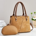 Chic mustard yellow tote bag set with metal K logo and crossbody strap on white background - Earthy Yellow