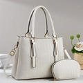 Close-up of cream woven texture tote bag and matching pouch with gold metal hardware - Off-white