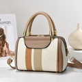 Minimalist woven pillow handbag with orange and brown stripes and a leather handle - Off White