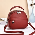 Borsa a tracolla in pelle rosso vino con cerniere argento e design a strati - Rosso