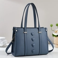 Elegant Morandi blue lychee leather bucket bag with heart embossed details and gold hardware - Blue