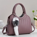 Purple bucket bag with geometric embossed pattern and cute plush animal charm - Purple
