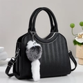 Fashionable black bucket bag with snakeskin texture and elegant silver metal trim - Black