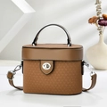 Detail of a brown cylinder bucket bag with a blend of smooth leather and woven textures - Khaki