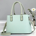 Elegant mint green crossbody pillow bag with gold hardware for outdoor travel - Green
