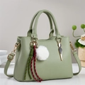 Chic light green lychee pattern leather tote bag with gold hardware and plush charm - Green
