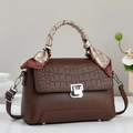 Brown leather handbag with crocodile flap, silk scarf handle, and silver buckle closure - Coffee
