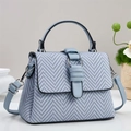 Light blue and white textured woven shoulder bag with silver hardware and top handle - Blue