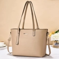 Elegant beige tote bag with golden metal trim and adjustable strap for women - Khaki