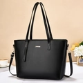 Classic black PU leather tote bag with gold hardware and adjustable shoulder strap - Black