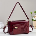Burgundy faux crocodile leather crossbody bag with gold lock and adjustable strap - Burgundy