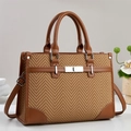 Classic herringbone patterned tote bag with brown leather trim and silver metal twist lock - Earthy Yellow