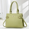Minimalist light green lychee faux leather tote bag with gold twist lock and shoulder strap - Green