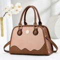 Elegant patchwork tote bag with pink and brown textured leather and wavy edge detail - Pink