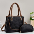 Elegante borsa a mano in pelle scamosciata nera con manici marroni e pochette - Nero