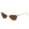 Translucent champagne cat eye sunglasses with brown lenses in a 45-degree angle view - Orange