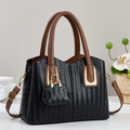 Chic black and brown woven leather tote bag with gold U-shaped hardware and strap - Black