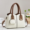 Chic cream and brown leather tote bag with woven texture and gold hardware accents - Off White