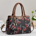 Sac à main élégant noir avec motifs cerises rouges et bandoulières marron - Noir