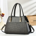 Women's charcoal tote bag featuring crocodile embossed leather and golden hardware details - Gray
