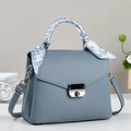 Blue-grey litchi leather crossbody bag with a decorative silk scarf on the handle - Blue
