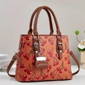 Fashionable orange-brown tote bag with red cherry print and leather handles - Earthy Yellow