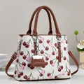 Large capacity trapezoidal handbag with cherry print, leather handles and crossbody strap - Off White