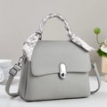 Off-white pebble leather crossbody bag with silk scarf handle and silver twist lock - Gray