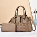 Detailed view of khaki handbag and matching long wallet with geometric texture - Khaki