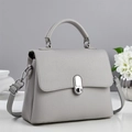 Grey pebbled leather handbag with silver oval lock and top handle for women - Gray