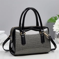 Chic black patent leather boston handbag featuring silver glitter panel and gold metal hardware - Black