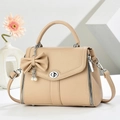 Beige faux leather crossbody bag with silver twist lock and pearl bow detail - Apricot