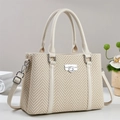 Elegante borsa a tracolla intrecciata beige con chiusura girevole e cinturini - Bianco Sporco