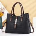 Black faux crocodile leather tote bag with dark brown handles and silver metal clasp - Black