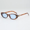 Retro-Oval-Sonnenbrille in Schildpatt-Optik mit hellblauen Gläsern und Goldakzenten - Schildpatt Rahmen Blaue Linsen
