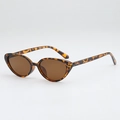Cat eye tortoiseshell sunglasses with brown lenses and metal dot accents in 45-degree view - Tortoise Shell Frame