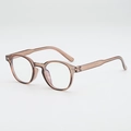 Lunettes de soleil ovales rétro marron thé transparent avec rivets et monture élégante - Protection UV400 / Monture Thé Plano