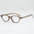 Occhiali da sole vintage cat-eye con montatura in resina caffè trasparente e borchie - Montatura Tè Trasparente Lente Chiara