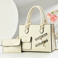 Détail de l'ensemble sac fourre-tout crème en similicuir avec fermetures éclair décoratives - Blanc Cassé