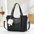 Chic black contrast bucket bag with woven texture, golden buckle and cute plush charm - Black