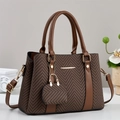 Brown herringbone tote bag with leather trim and gold metal details for daily commute - Coffee
